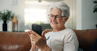 Buy stock photo Old woman, smile and scroll in home with phone, browsing and social media gossip for entertainment. Happy, elderly person and glasses in house with tech, text message and mobile app for online news.