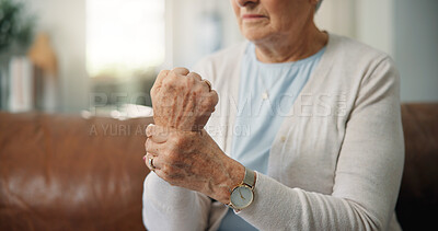 Buy stock photo Senior woman, hands and wrist pain with injury on sofa for carpal tunnel syndrome in home. Elderly, female person or sore arm with ache or strain for joint inflammation, arthritis or muscle tension