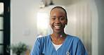 Healthcare, portrait and smile of nurse black woman in apartment for assisted living or home care. Medical, scrubs and trust with happy African person in lounge for aid, consulting or wellness