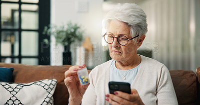 Buy stock photo Old woman, phone and pills on sofa with search for prescription, supplements or medicine in home. Elderly person, smartphone and pharma drugs on couch, mobile app and healthcare product in retirement