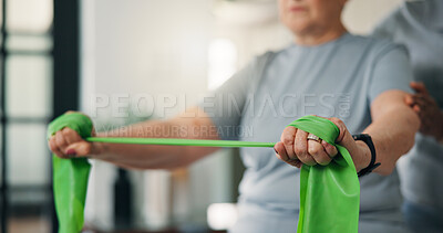 Buy stock photo Physiotherapy, resistance band and hands of old woman in home, strength or help to exercise. Senior person, physical therapy or assistance for muscle recovery, rehabilitation or fitness in retirement