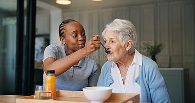 Buy stock photo Caregiver, breakfast and feeding senior woman for healthcare, wellness and support in morning. Nurse, elderly person and help with food, eating and assisted living with medical service in home