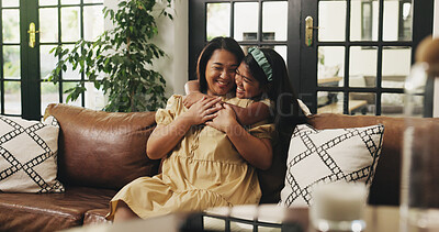 Buy stock photo Love, mother and child with hug on sofa for bonding together, healthy relationship or security. Happy family, mom or kid with embrace in home for connection, support or affection with care on weekend