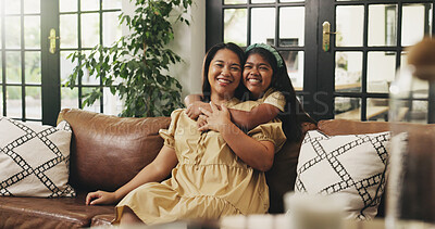 Buy stock photo Mother, child and hug portrait on sofa for bonding together, healthy relationship or security. Happy family, mom or girl with embrace in home for connection, support or affection with love on weekend