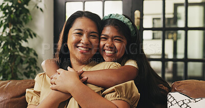 Buy stock photo Mom, child and hug portrait on sofa for bonding together, healthy relationship or security. Happy family, mother and girl with embrace in home for connection, gratitude and affection on weekend break