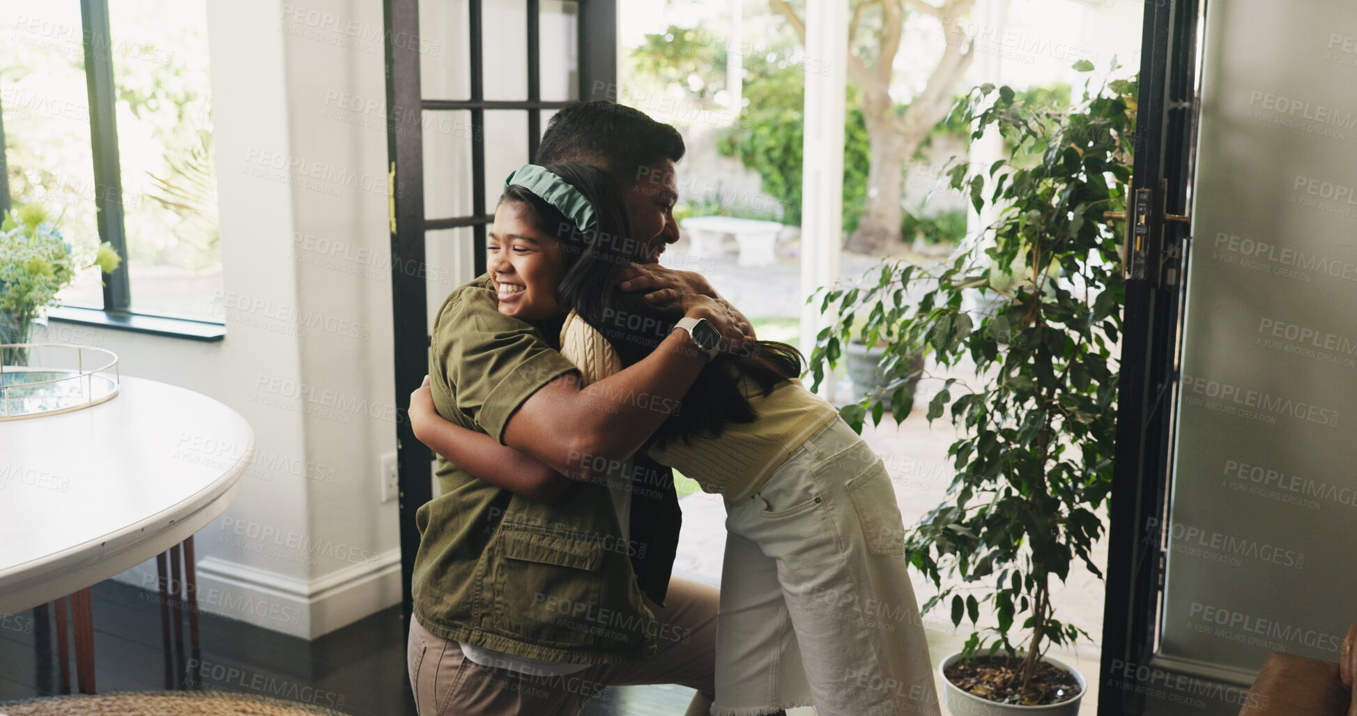 Buy stock photo Dad, child or hug with goodbye in home for love, safety or care together by door or entrance. Father, kid or daughter with smile, parent or guardian for embrace, farewell or holiday greeting in house