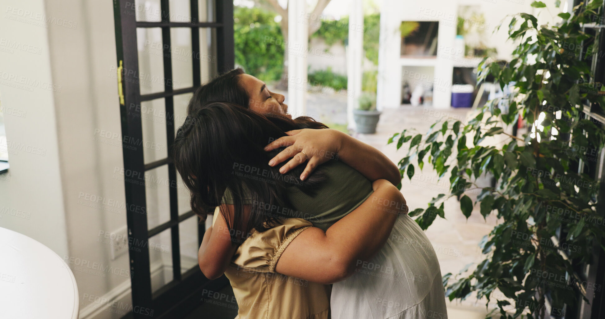 Buy stock photo Mother, child or hug with greeting in home for love, safety or care together by door or entrance. Mom, kid or daughter with smile, parent or guardian for embrace, farewell or holiday goodbye in house