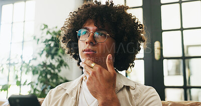 Buy stock photo Man, phone and thinking on sofa with texting in home, relax and glasses with online dating in lounge. Person, smartphone and decision on couch with mobile app, contact or social media at apartment