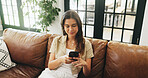 Cellphone, relax and woman on sofa in home with networking, communication or chatting on mobile app. Notification, technology and person with phone for online texting, blog or contact in living room.