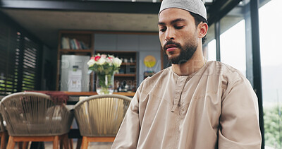 Buy stock photo Muslim, man and prayer for faith with worship, salah and routine with Islam belief in home. Respect, devotion and Islamic person kneeling in house for gratitude, trust in God or Allah for religion