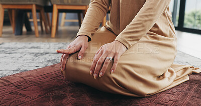 Buy stock photo Muslim person, hands and pointing in salah with mat for worship, prayer or islam faith in home. Closeup, direction and religion with indiction in tashahhud to qibla for Allah or praise god in house