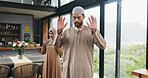 Muslim man, prayer and leading salah with worship for islam, religion or faith together in home. Man, woman and praying with praise, allah or god for spiritual connection, culture or tradition