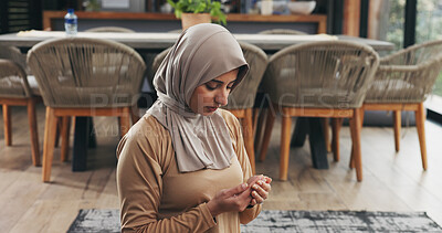 Buy stock photo Muslim, woman and praying in home for faith, religion and meditation on Ramadan Kareem for peace. Islam, holy prayer and person worship God with spiritual devotion, salah and praise Allah in house