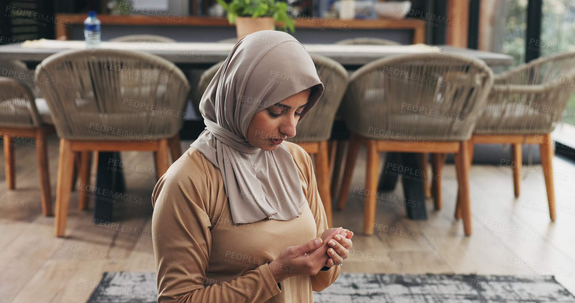 Buy stock photo Muslim, woman and praying in home for faith, religion and meditation on Ramadan Kareem for peace. Islam, holy prayer and person worship God with spiritual devotion, salah and praise Allah in house