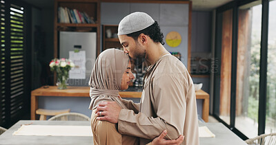 Buy stock photo Love, forehead kiss and muslim couple in home with bonding, care and marriage together. Relationship, trust and islamic man with woman for connection with religious belief in house on weekend.