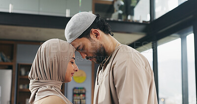 Buy stock photo Love, forehead touch and muslim couple in home with bonding, care and marriage together. Relationship, trust and islamic man with woman for connection with religious belief in house on weekend.