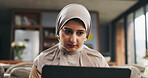 Muslim woman, laptop and reading in lounge for learning, online Quran course or Arabic language studying. Education, pc or person with hijab in home for religious understanding, theology or knowledge