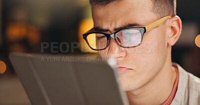 Buy stock photo Night, tablet and man with glasses, confused and online reading for web development. Evening, eyewear and person with tech, bokeh and digital app for programming, review stats and problem solving