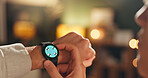Hands, man and smart watch in home at night for time, check notification and sleep schedule. Bokeh, male person and wristwatch for reading message, app update and online reminder for bedtime at house