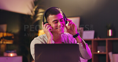 Buy stock photo Creative, laptop and man with headphones, office and happy with sound, listening and post production. Editing, music and audio engineer with tech for project, online and person with deadline at night