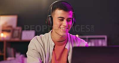 Buy stock photo Office, headphones and man with laptop, online and creative for deadline, music and post production. Editing, sound and audio engineer with smile for project, working late and person with technology