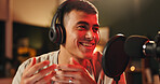 Content creator, man and microphone for podcast, recording or night broadcast for radio host dj. Live streaming, headphones or streamer reading script for online interview, discussion or talk on tech