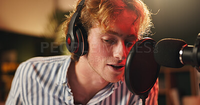 Buy stock photo Streamer, man and reading with mic for podcast, recording or night broadcast for radio host dj. Live streaming, headphones or content creator with script for online interview or discussion on tech