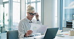 Woman, accounting and documents with laptop at office for review, charts or glasses at company. Mature person, computer and stats with paperwork, administration and revenue graphs at financial agency