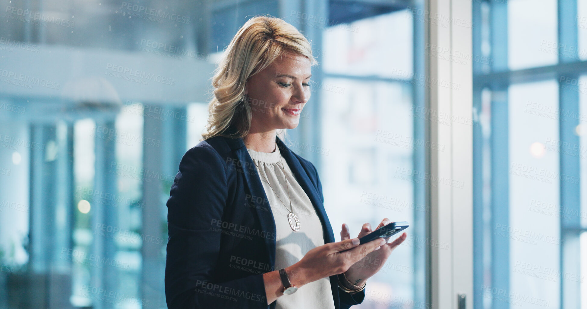 Buy stock photo Woman, phone and smile with texting at office with networking, contact or notification at insurance company. People, advisor or broker with smartphone, app or happy for risk assessment job at agency