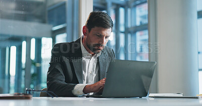 Buy stock photo Reading, typing and businessman in office with laptop for research on coding project with IT. Computer, professional and male software engineer with report for website programming in workplace.