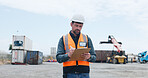 Man, logistics and writing with clipboard in yard for shipping control or supply chain safety. Male person, inspection or storage operator with inventory check or container checklist for distribution