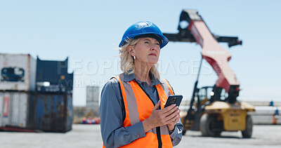 Buy stock photo Construction, mature or woman with phone for inspection, infrastructure or building schedule update. View, property timeline or project manager with development report on mobile, outdoor or progress
