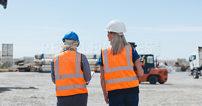 Buy stock photo Back, team and planning at shipping yard for supply chain, inspection or collaboration. Women, supervisor or clipboard for shipment at dock for freight, logistics schedule or export cargo in industry