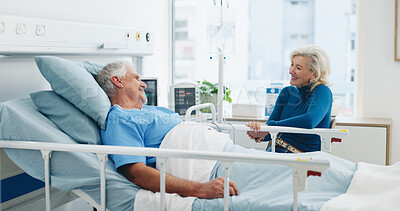 Buy stock photo Happy, couple and support for old man, hospital and visit after surgery, laugh and talk with partner. Clinic, healthcare and elderly people with smile for recovery, chat and care for senior patient