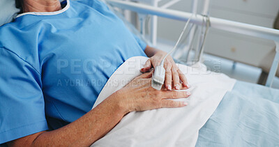 Buy stock photo Hands, hospital bed and woman with oximeter to monitor pulse, healthcare or measure blood levels. Patient, medical service or person in clinic, track oxygen or wellness with rest for recovery or sick