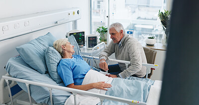 Buy stock photo Old couple, trust and holding hands by hospital bed with support, kindness and empathy for recovery. Married, elderly people and care in medical clinic with compassion, conversation or health update.
