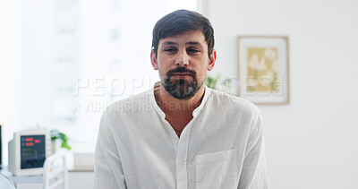 Buy stock photo Thinking, patient and man in hospital for healthcare, wellness or wait for appointment with anxiety. Medical clinic, serious person and reflection for checkup with worry, disease diagnosis and stress