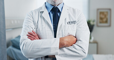 Buy stock photo Hospital, hands and doctor with arms crossed, healthcare and medical professional with duty to help. Clinic, specialist and mature person with uniform for health services, wellness and medicine