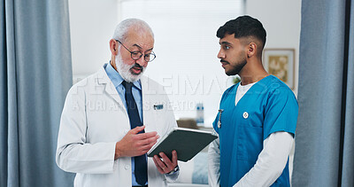 Buy stock photo Men, doctors and tablet for discussion at clinic with review, checklist or insight for medical report. People, mentor and team with tech, application or feedback for healthcare services at hospital
