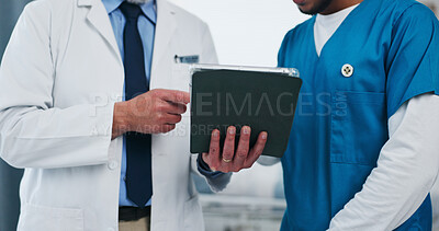 Buy stock photo Hands, doctors and tablet for discussion at hospital for team review, checklist or insight for medical report. People, nurse and surgeon with tech, app and feedback for healthcare services at clinic