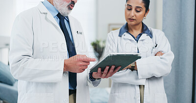 Buy stock photo Hands, doctors and tablet for review with team for insight, checklist and medical report at hospital. People, planning and discussion with tech, app or feedback with healthcare services at clinic