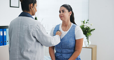 Buy stock photo Doctor, women or breathe in office with stethoscope, heart assessment or respiratory exam for advice. People, healthcare worker or patient in consultation with medical equipment, evaluation and chat.