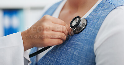Buy stock photo Doctor, hand and patient with stethoscope, chest assessment and evaluation for cardiology advice. People, healthcare worker and check heartbeat in medical clinic with equipment, examination and help.