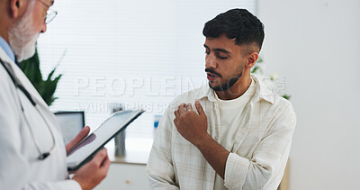 Buy stock photo Doctor, shoulder pain and consultation with tablet, healthcare symptoms or assessment. Men, medical worker and patient with injury, checkup or diagnosis report with technology for help in clinic
