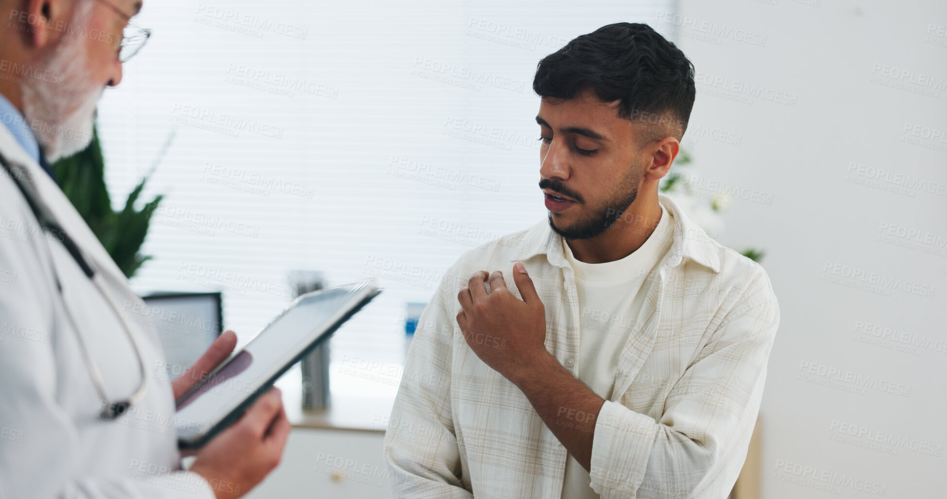 Buy stock photo Doctor, shoulder pain and consultation with tablet, healthcare symptoms or assessment. Men, medical worker and patient with injury, checkup or diagnosis report with technology for help in clinic