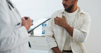 Buy stock photo Doctor, hand and consultation with tablet, chest pain and healthcare symptoms for heart assessment. Sick man, medical worker and patient with lung checkup, help or cardiology with tech in hospital