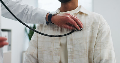 Buy stock photo Doctor, hand and man with stethoscope, chest assessment and cardiology evaluation for medical advice. People, healthcare worker and patient in clinic with equipment, asthma test or heart examination.