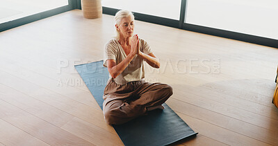 Buy stock photo Mature woman, zen and prayer hands at yoga studio with mudra for breathing exercise in gym. Person, holistic fitness and above for mindfulness, class or namaste pose for meditation at wellness club