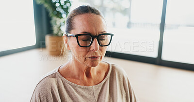 Buy stock photo Yoga, mature woman and meditation in studio for peace, zen and mindfulness with wellness. Yogi, person and eyes closed for calm, breathing and spiritual exercise for holistic health with bokeh