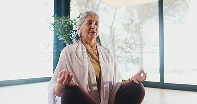 Buy stock photo Yoga, elderly woman and meditation in studio for stress relief, grounding practice or mindfulness. Zen, old person and lotus pose on mat for mental health, inner peace or holistic wellness with space